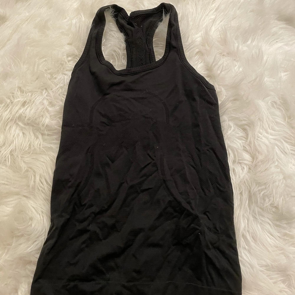 Lululemon swiftly tank in black size 4 GUC